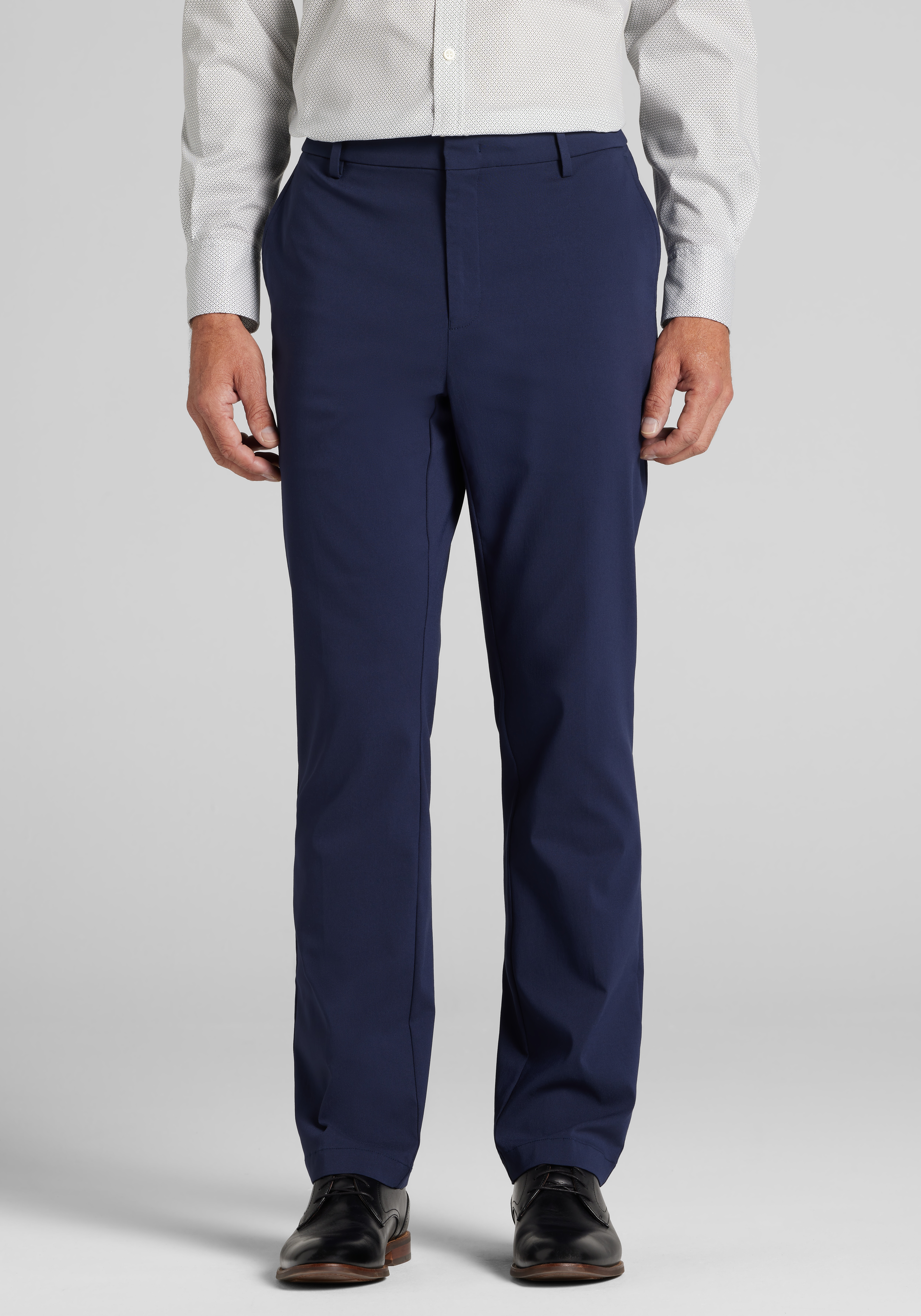 Men's FLYOUT_CATEGORY, Traveler&reg; COOL<i>MOTION</i> Tailored Fit Golf Chinos - Big & Tall - Jos A Bank