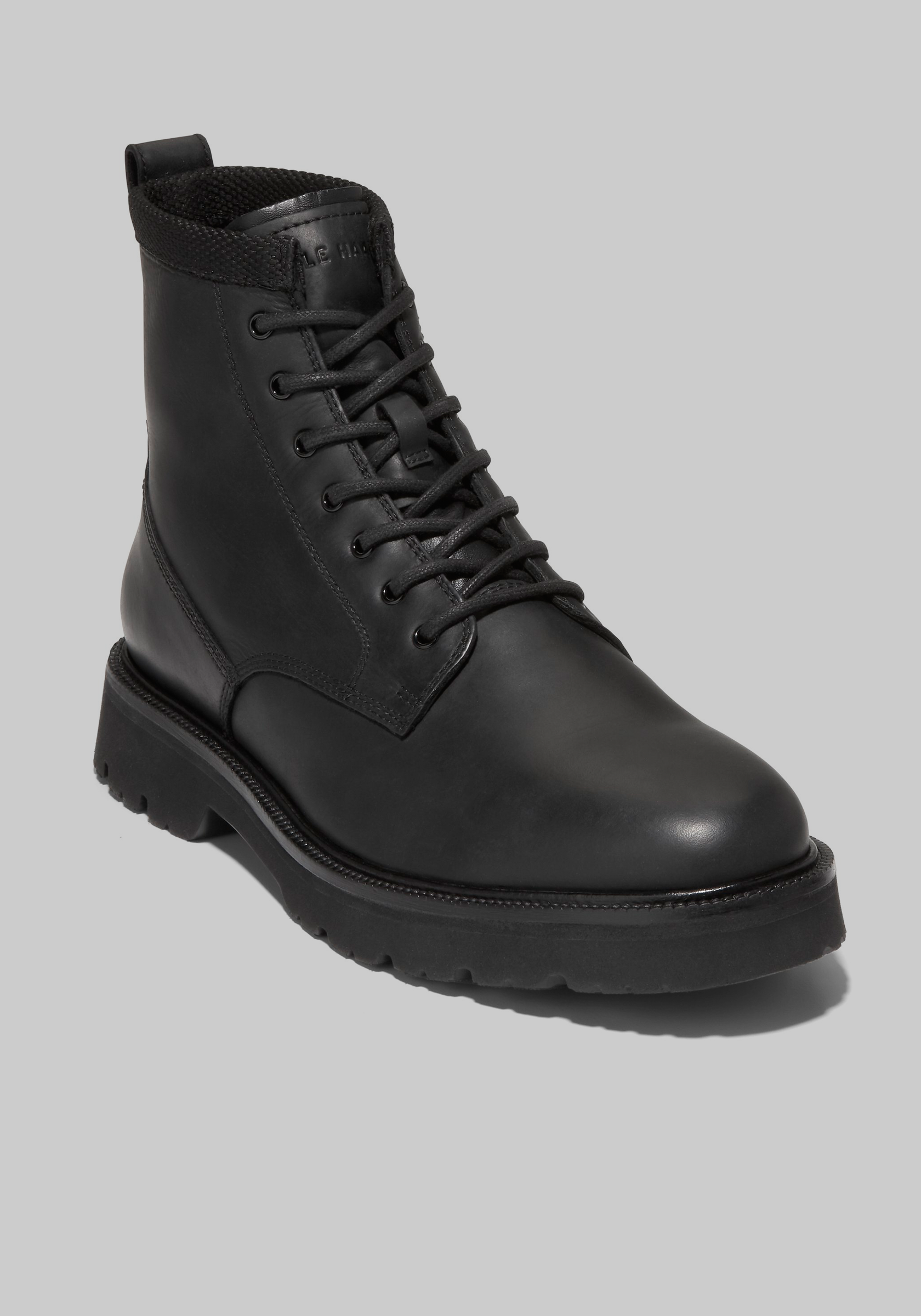 Cole haan best sale black leather boots