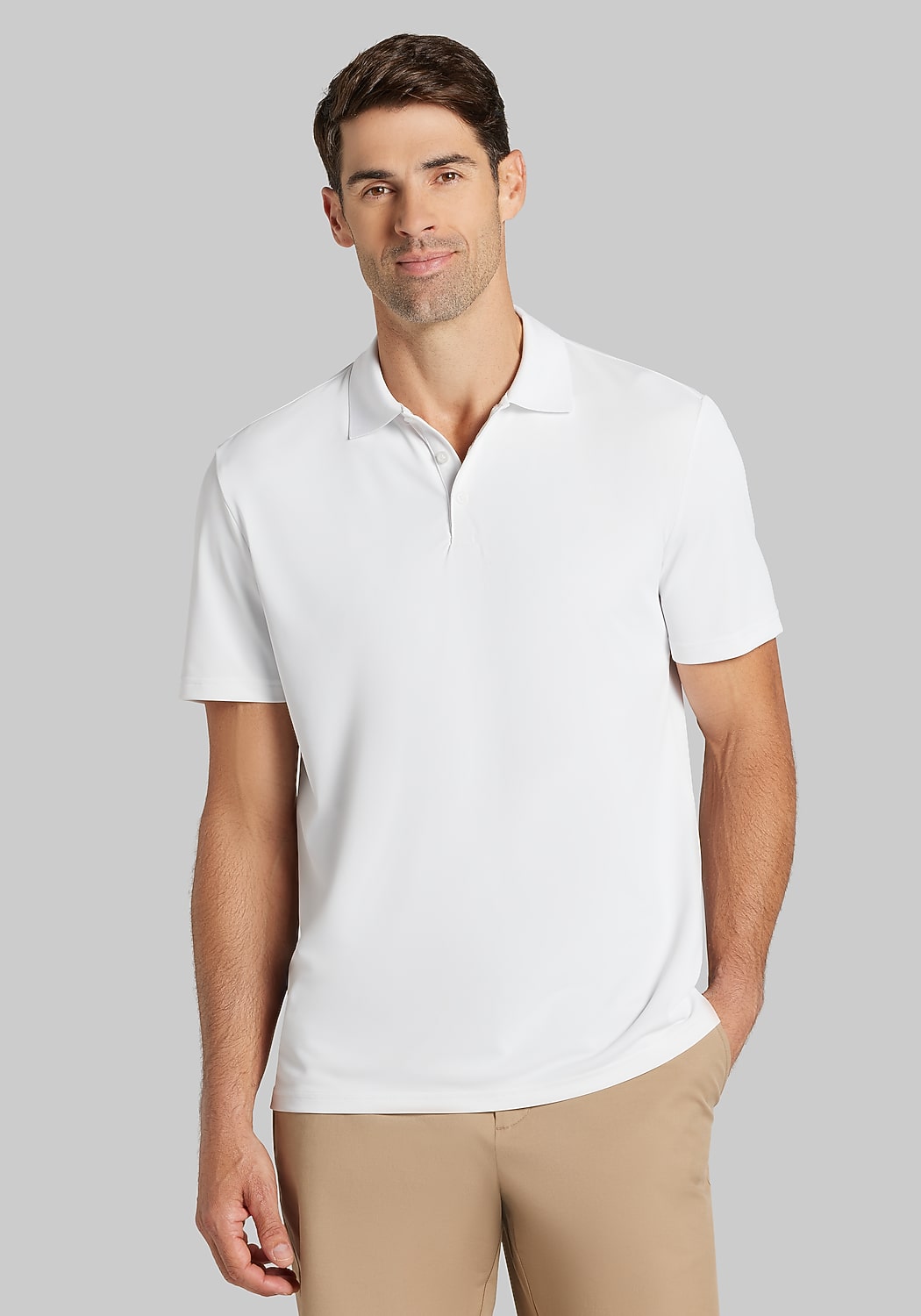 Traveler&reg; COOL<i>MOTION</i> Traditional Fit Solid Pique Short Sleeve Polo