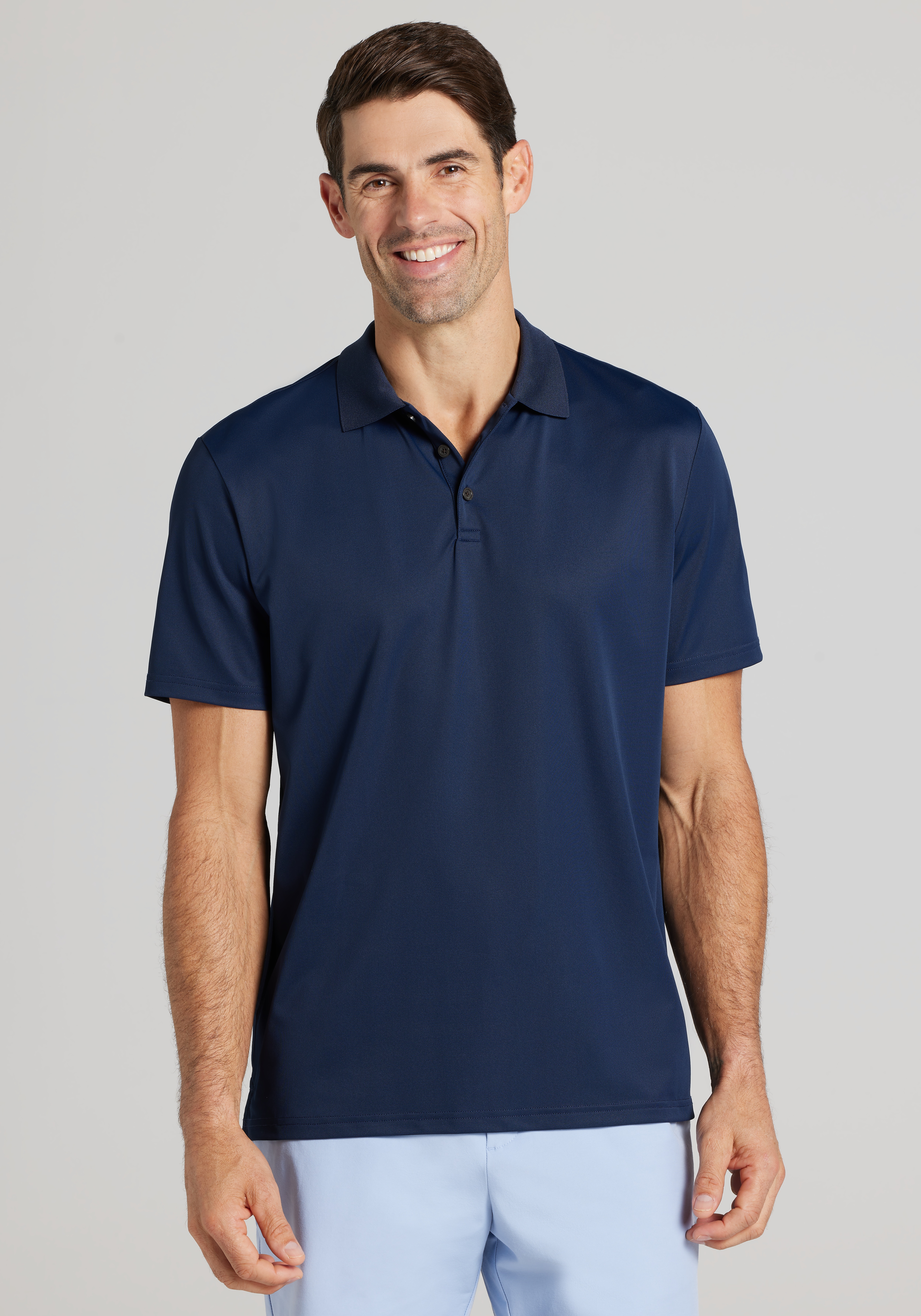 Men's New!, Traveler&reg; COOL<i>MOTION</i> Traditional Fit Pique Performance Polo - Jos A Bank