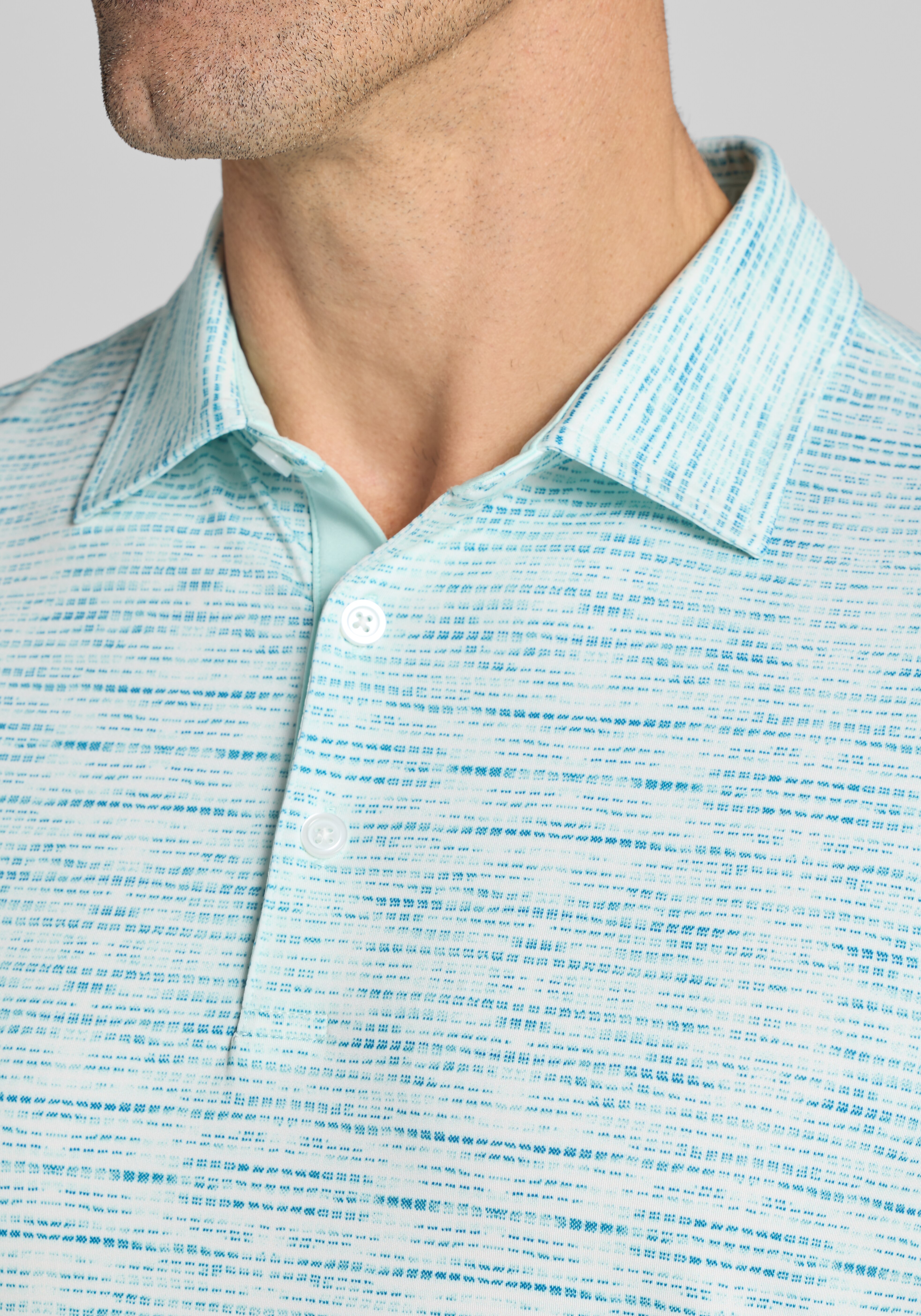 Traveler® Performance Tailored Fit Space Dye Grid Polo