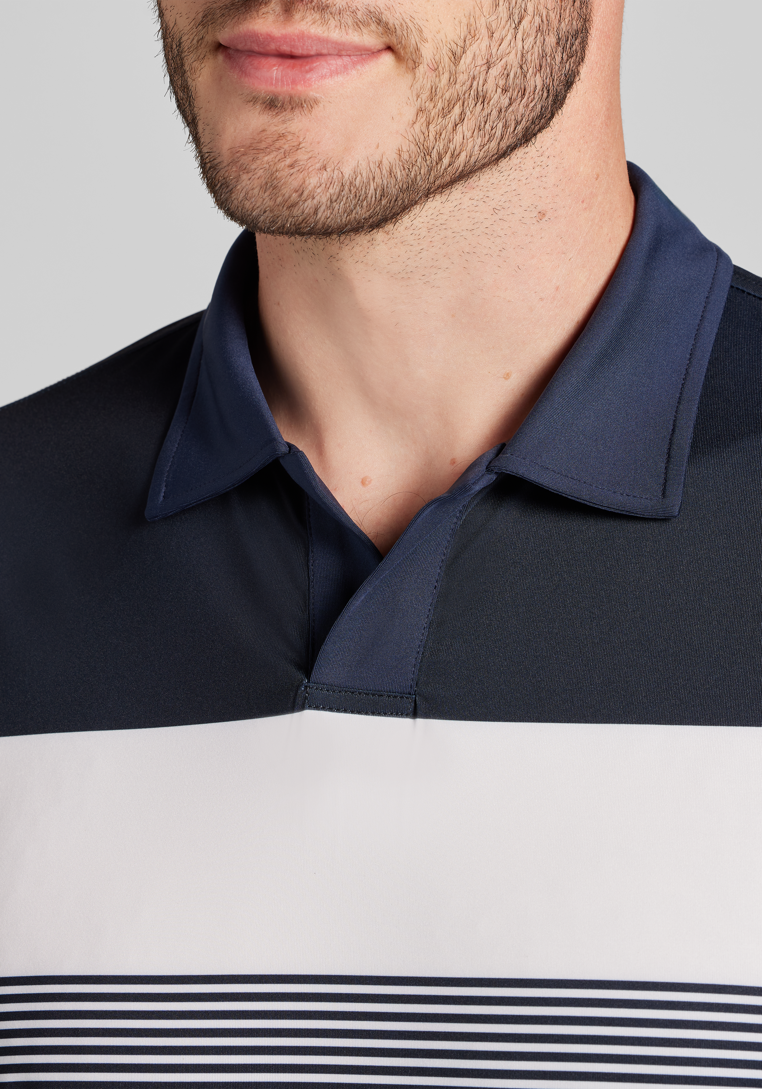 Traveler® Performance Tailored Fit Engineered Stripe Short Sleeve Polo