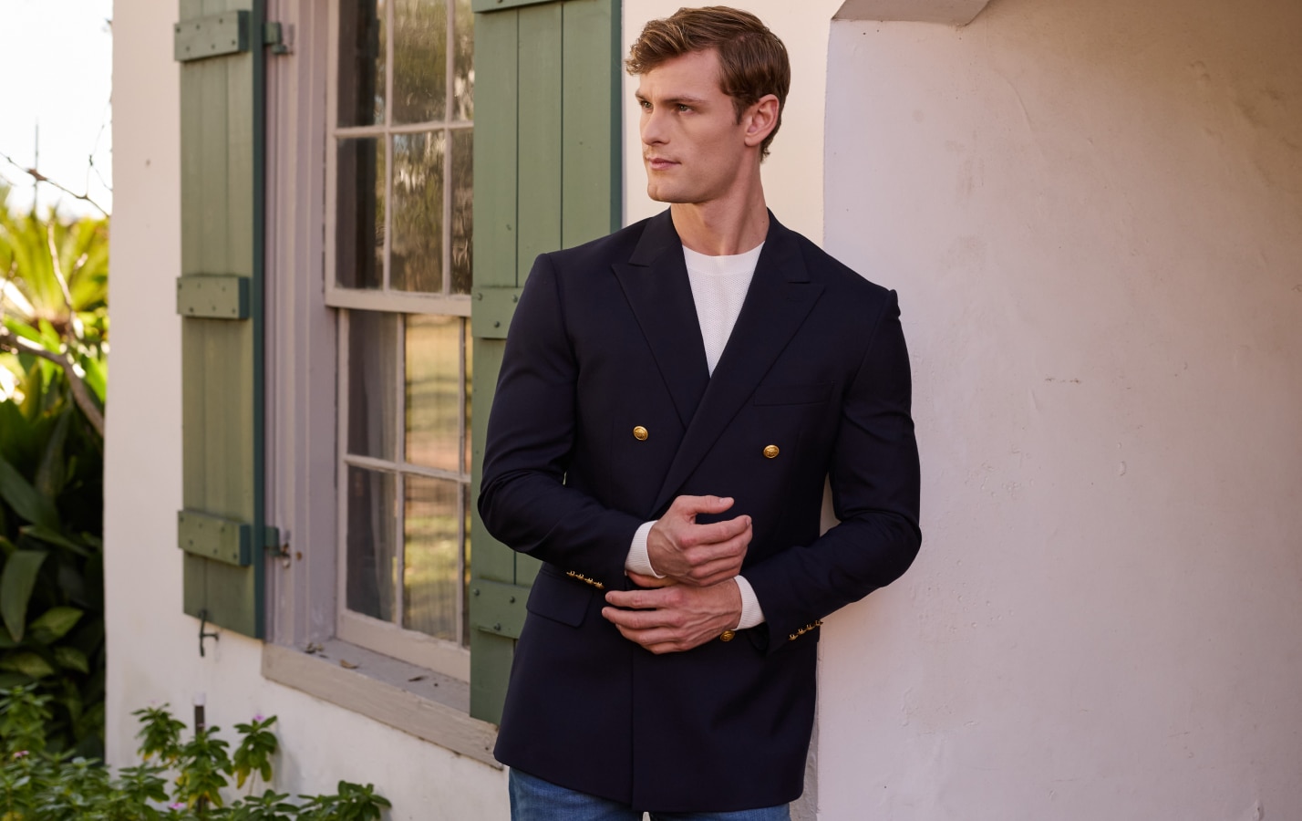 Man in navy double-breasted sportcoat