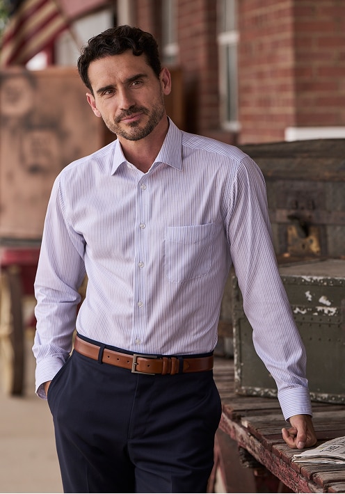 Man wearing a fine-striped dress shirt with navy pants and a brown leather belt