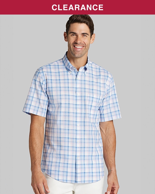 Man wearing a light blue and pink plaid casual shirt