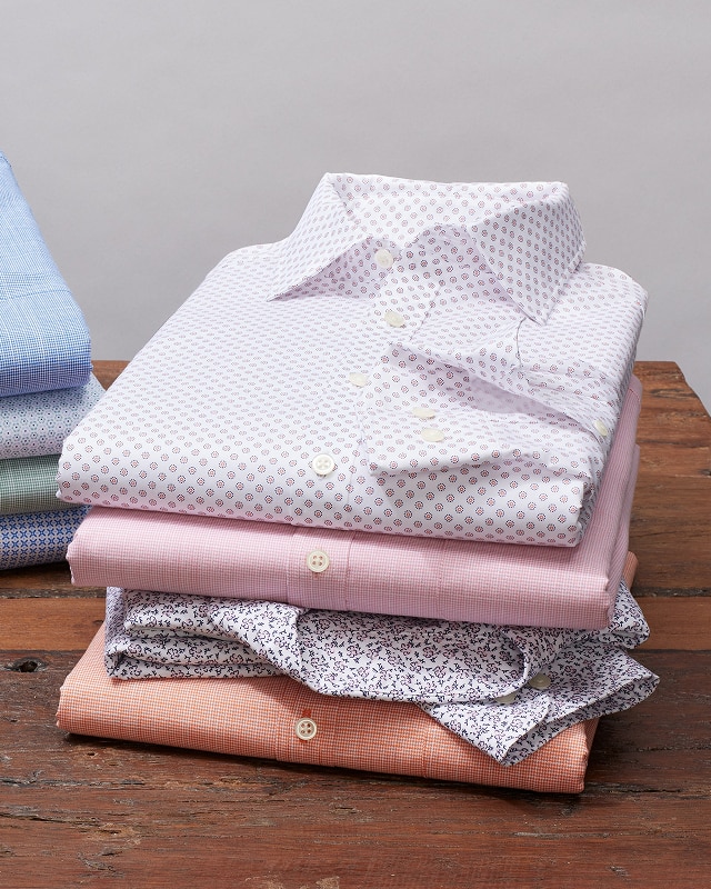 Stack of clearance casual shirts and polos