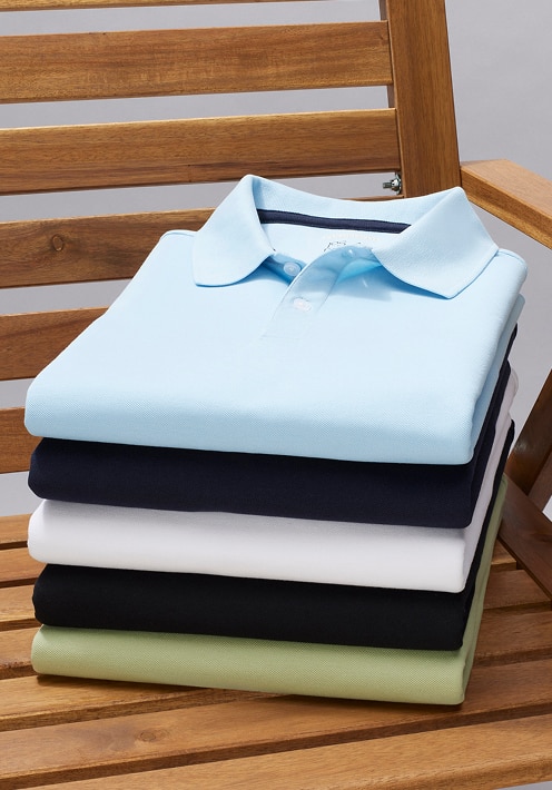 Stack of folded polo shirts