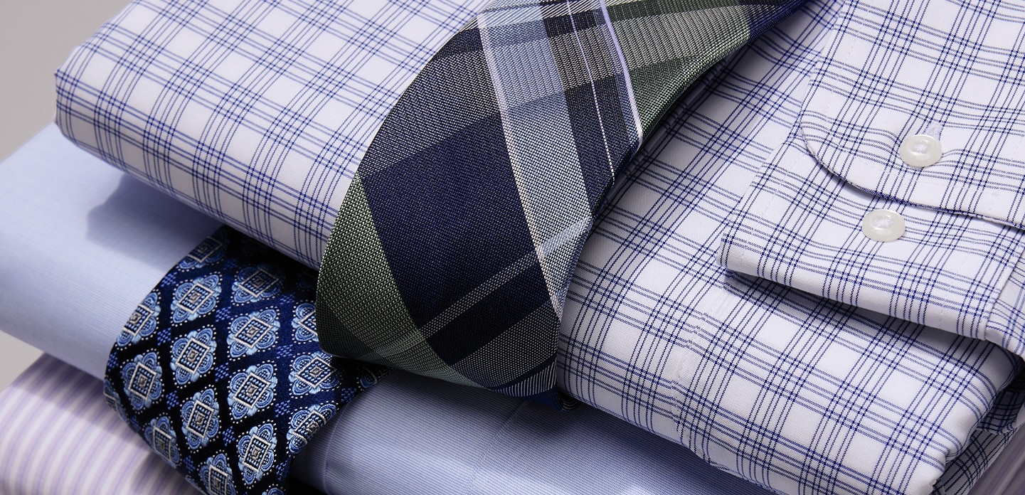 Neckties layered over folded dress shirts