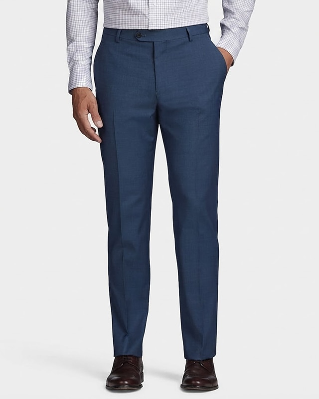 Man wearing navy dress pants