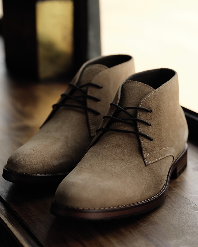 Pair of tan suede chukka boots