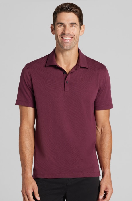 Man wearing a burgundy 1905 casual top