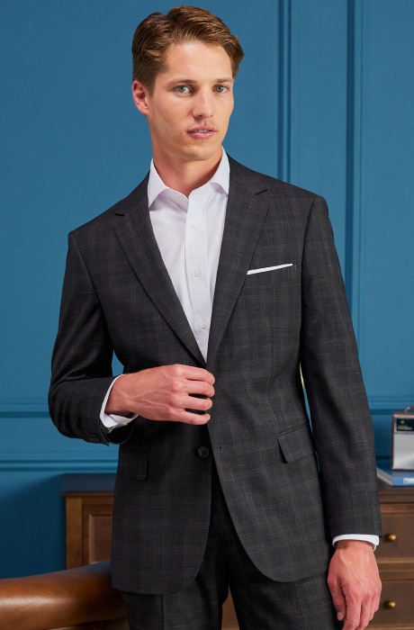 Man wearing a tan 1905 suit