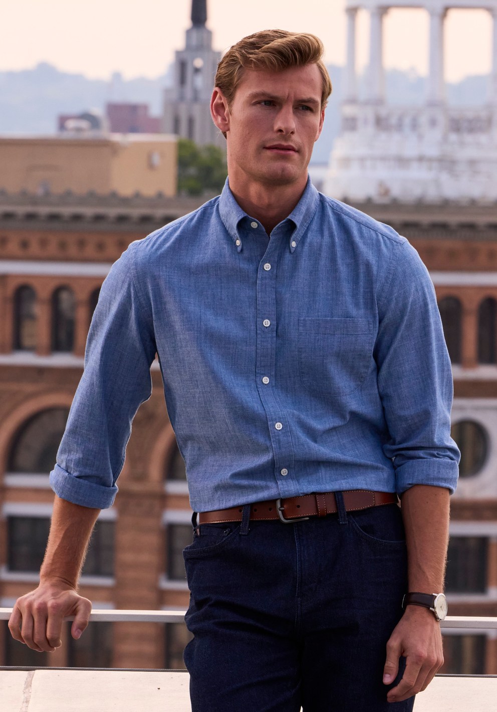 Man wearing a blue casual shirt