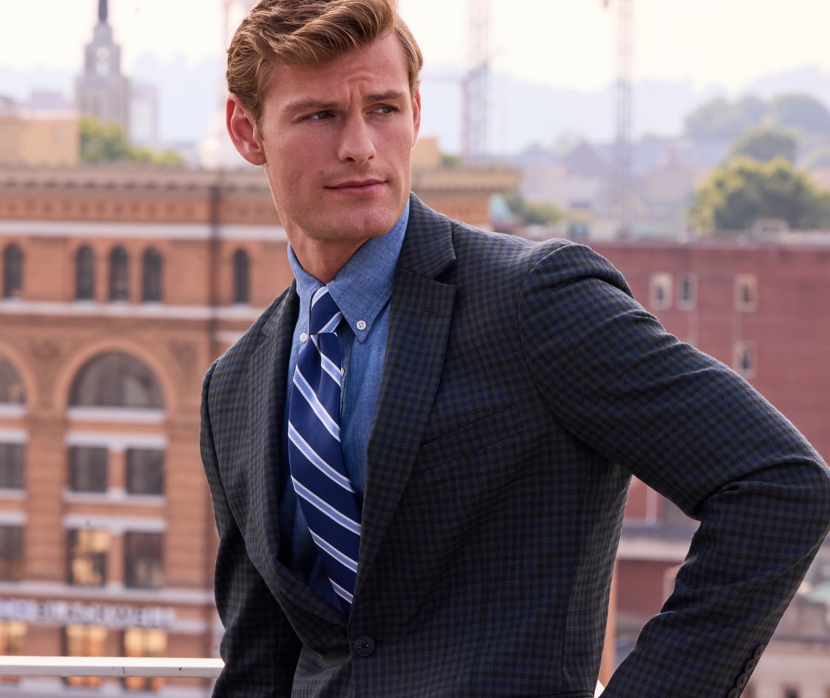 Man wearing a navy Traveler Collection sportcoat