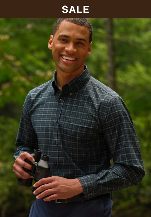 Sale. Man wearing a patterned casual shirt