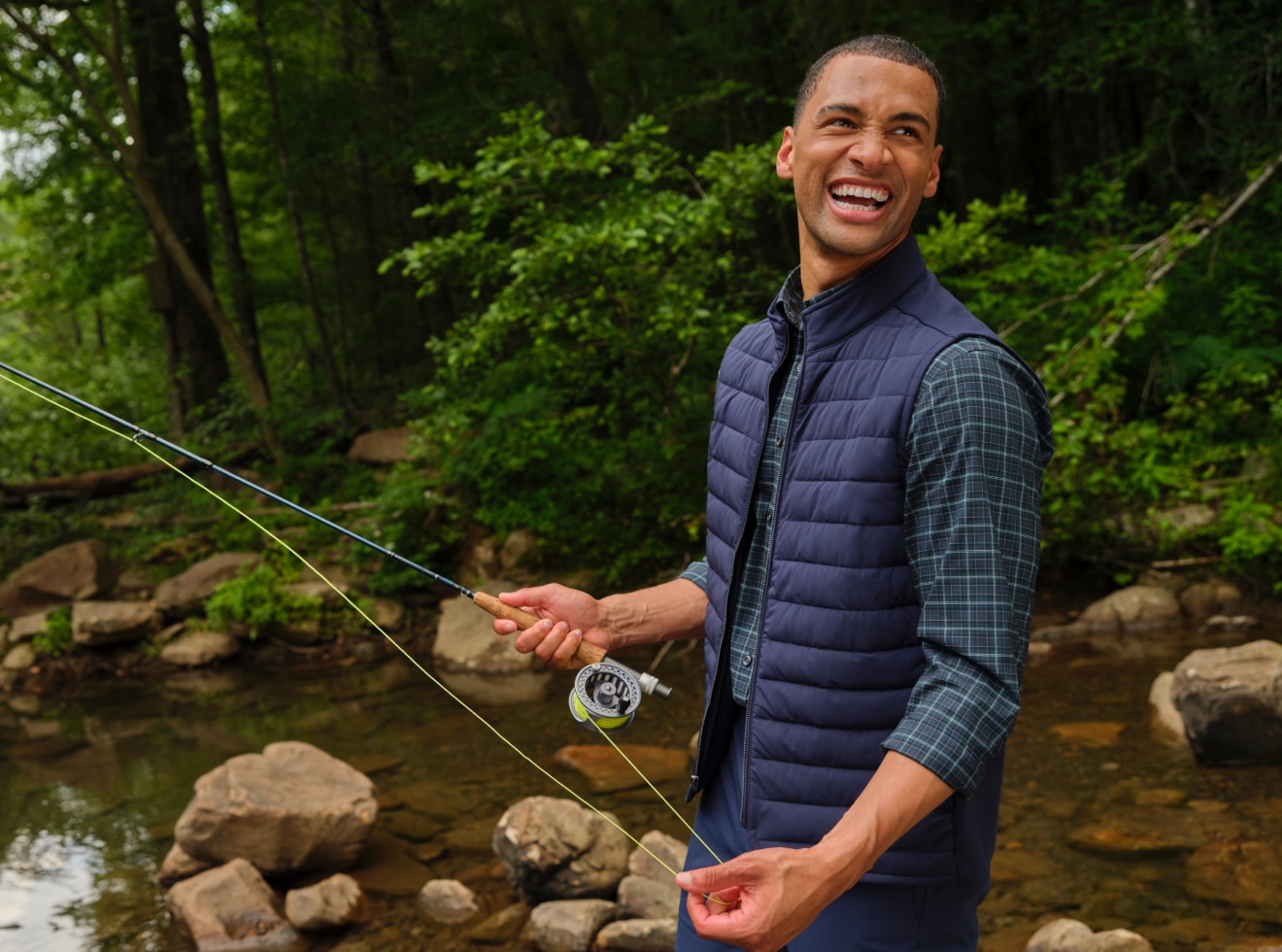 Man wearing a blue Traveler COOLMOTION casual shirt