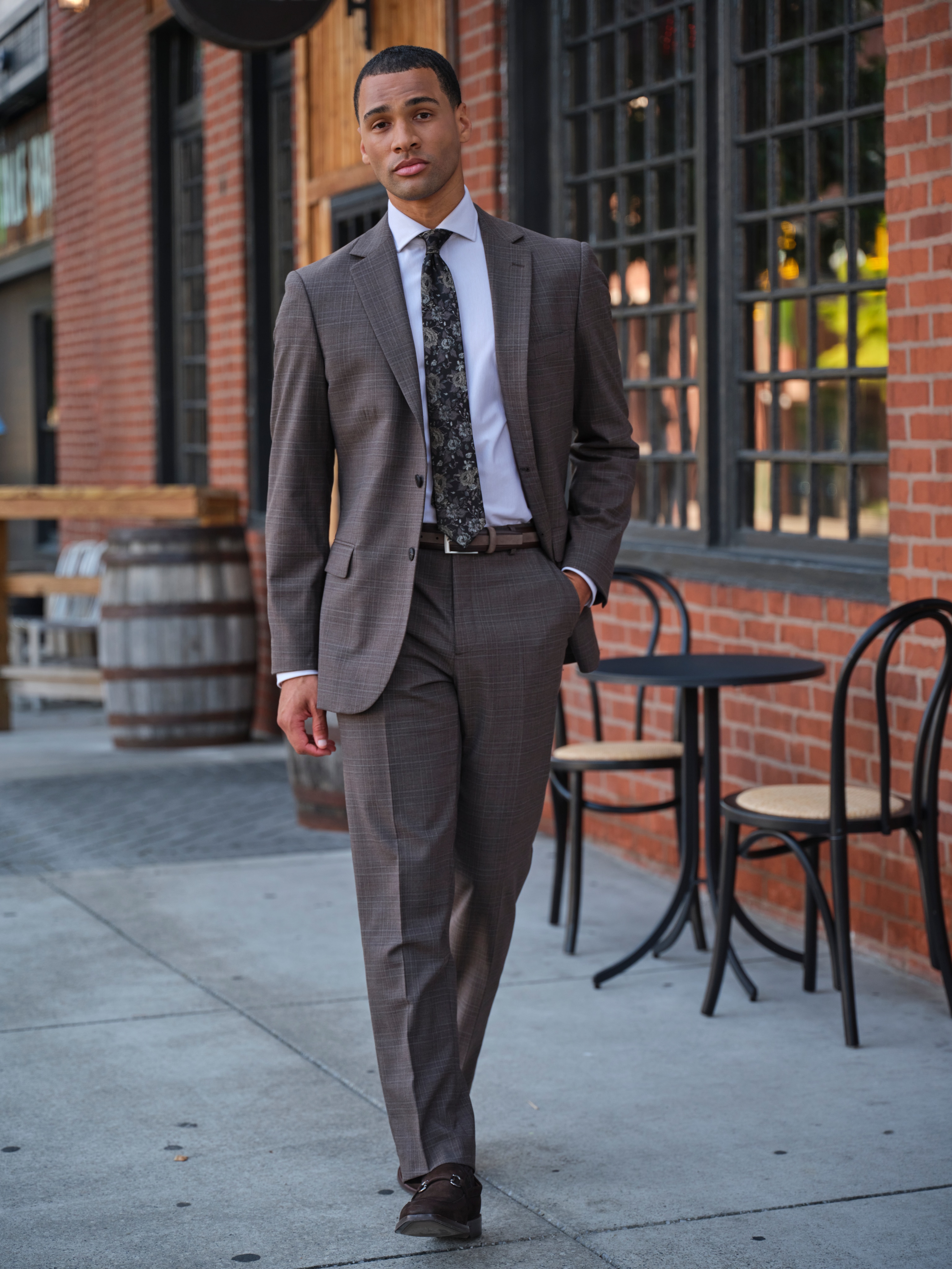 Man wearing a gray Traveler COOLMOTION suit