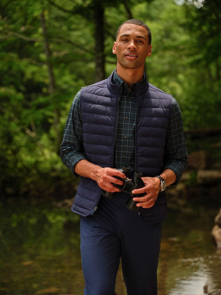 Man wearing a Traveler vest outdoors