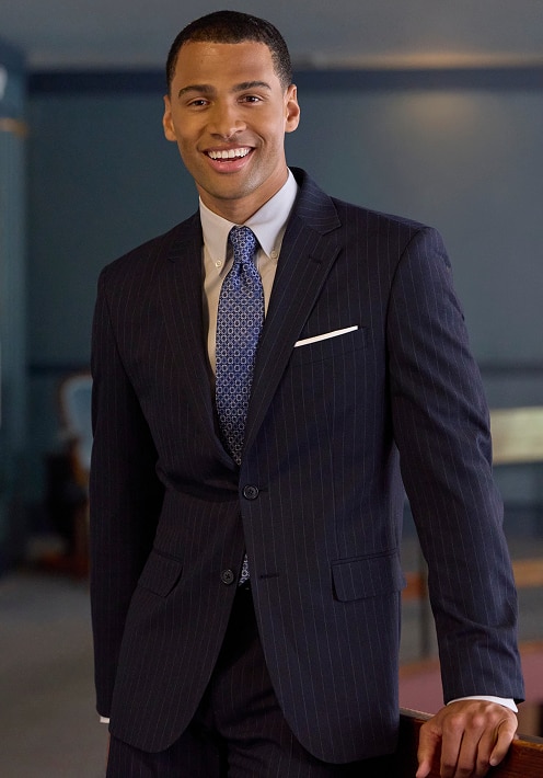 Two men wearing suits