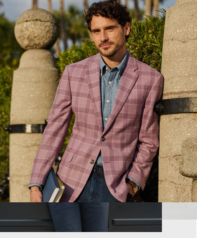 Man wearing a plaid sportcoat.