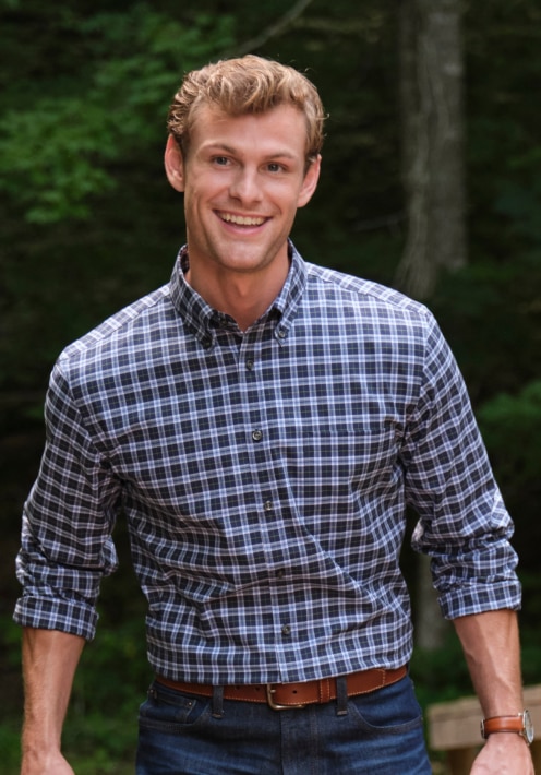 Man wearing a casual shirt and polo