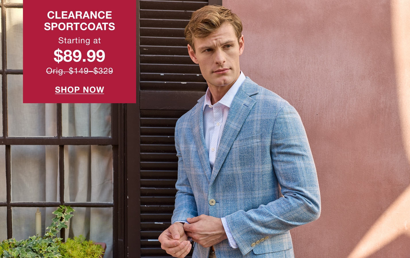 Man wearing a light blue plaid clearance sportcoat